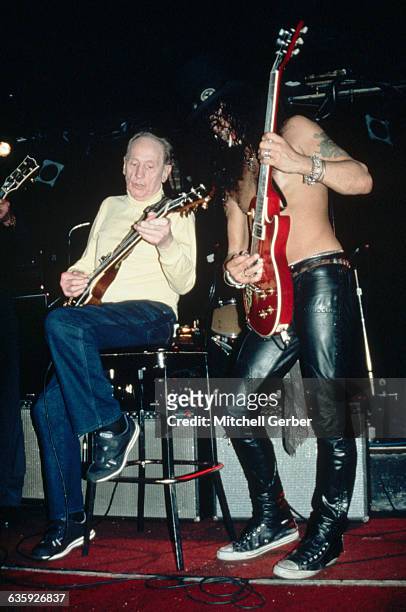 Les Paul and Slash Playing Guitars on Stage