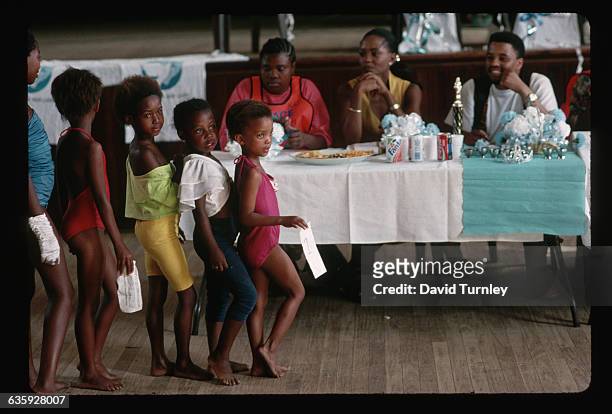 Little girls compete in a beauty contest in Tokoza township. | Location: Tokoza, South Africa.