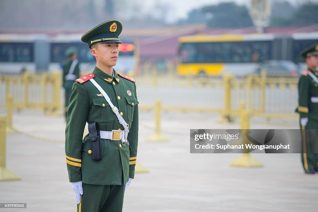 Chinese soldiers in change of guard marching in Tiananmen Square