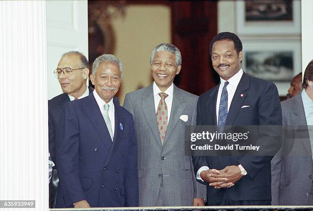 Nelson Mandela meets Mayor David Dinkins and Jesse Jackson at Gracie Mansion.