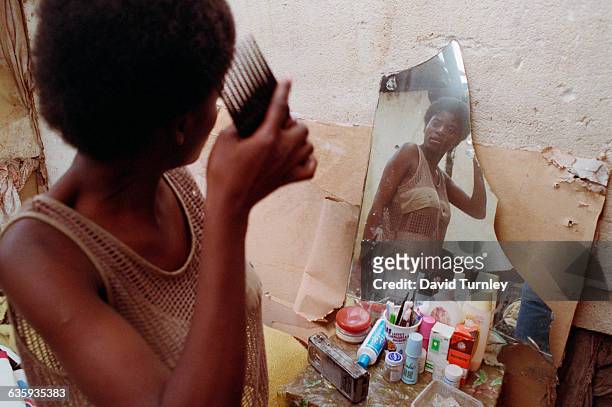 South African Teenager Combing Her Hair