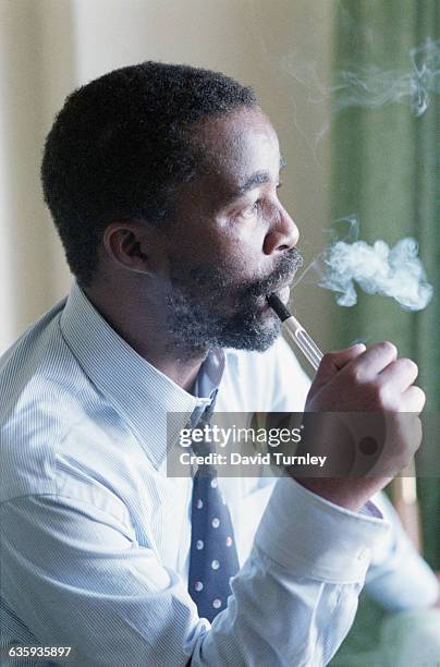 Thabo Mbeki Smoking a Pipe