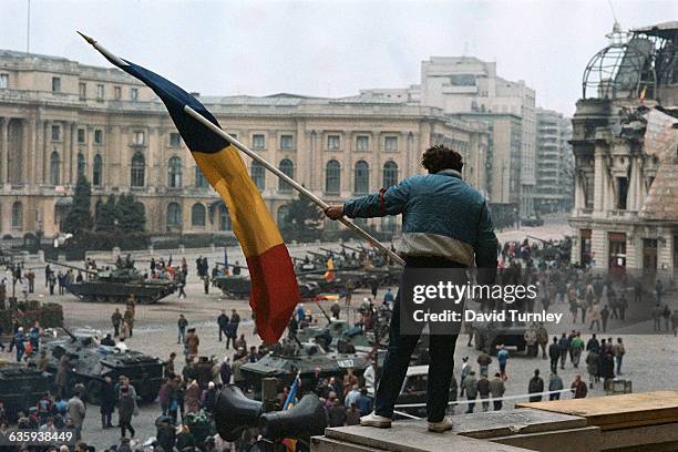 Romanians celebrate the end of Dictator Ceausescu's government.