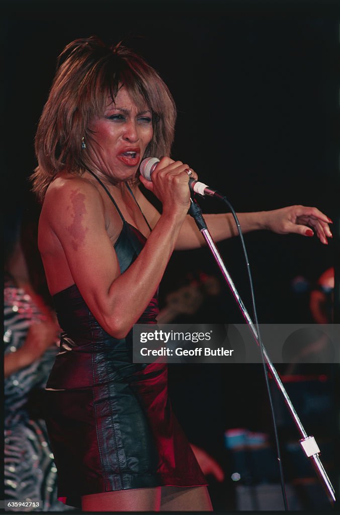 Tina Turner Singing in Black Dress