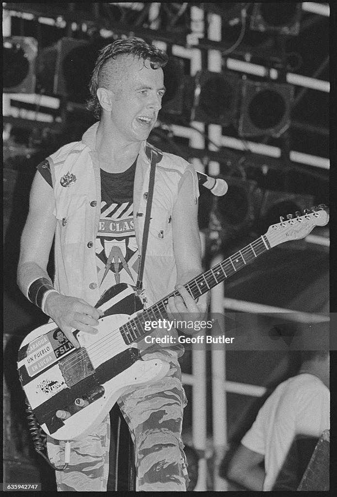 Joe Strummer of The Clash Playing Guitar