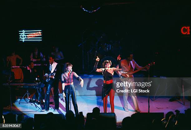 Chic performing in concert.