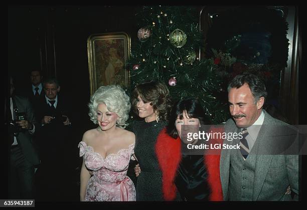 Cast of 9 to 5 at a Christmas Party