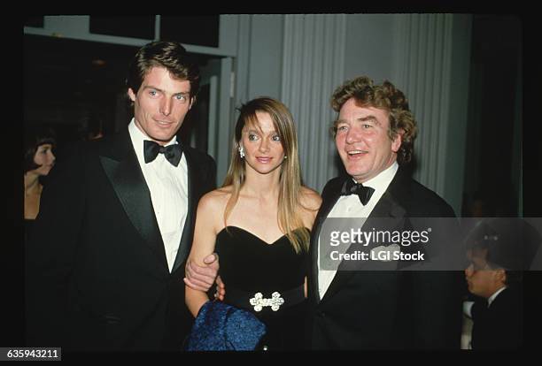Christopher Reeve poses with his girlfriend Gae Exton and actor Albert Finney.