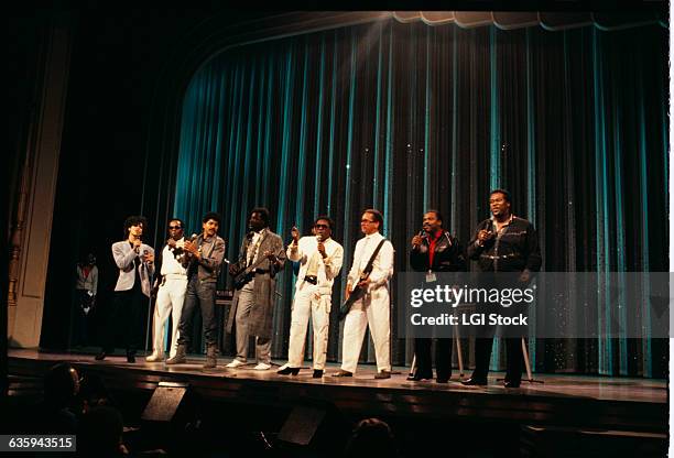 The Commodores, El Debarge, Lou Rawls, Billy Preston and Luther Vandross all perform on stage together.