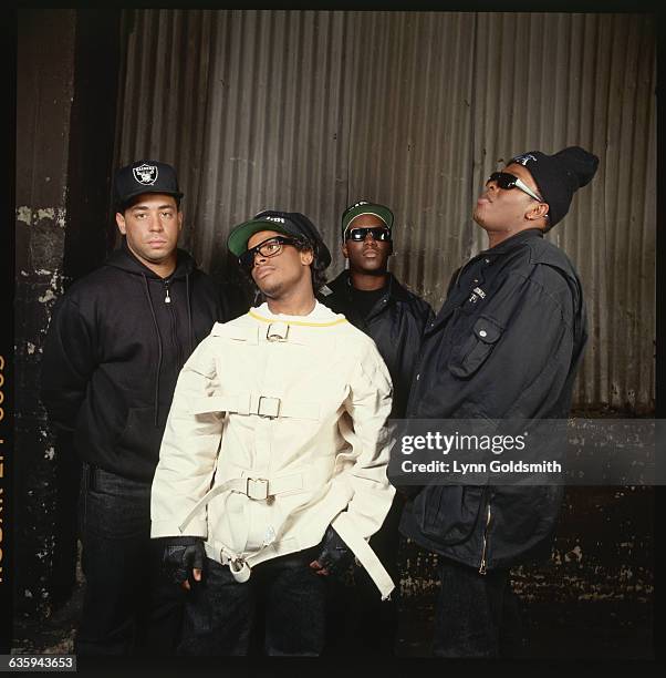 Portrait of members of the rap group, NWA, including DJ Yella, MC Ren, Eazy-E , and Dr. Dre .