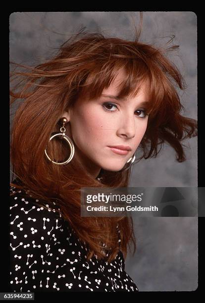 Pop singing sensation Tiffany is shown in a studio close-up. Head and shoulders photograph.