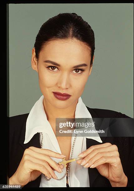 American actress, voice actress, singer and former model Tia Carrere, 1992.