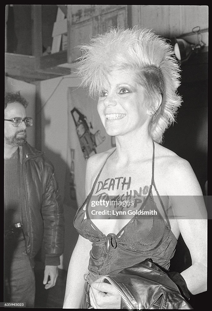 Wendy O. Williams of the Plasmatics with words painted on her chest