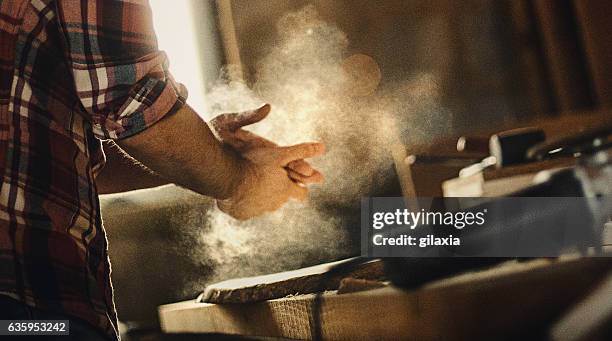 the job is done. - hands at work imagens e fotografias de stock