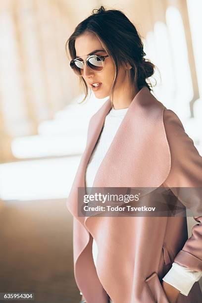 beautiful elegant woman - pink sunglasses stock pictures, royalty-free photos & images