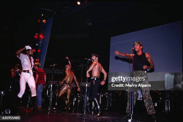 The Village People are fronted by Victor Willis. The line-up behind him is, left to right, Randy Jones, David Hodo, Felipe Rose, Glenn Hughes, and...