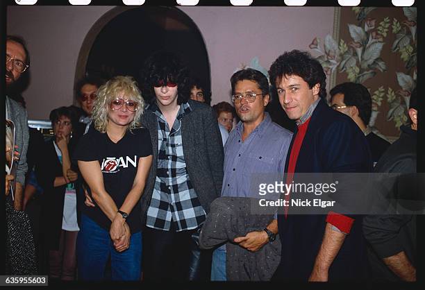 From left are MTV VJ Nina Blackwood, singer Joey Ramone, and director Jonathan Demme.