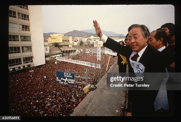 Kim Young Sam, running on an anti-government opposition platform, runs for the Korean presidency. He split the antigovernment vote with Kim Dae Jung...