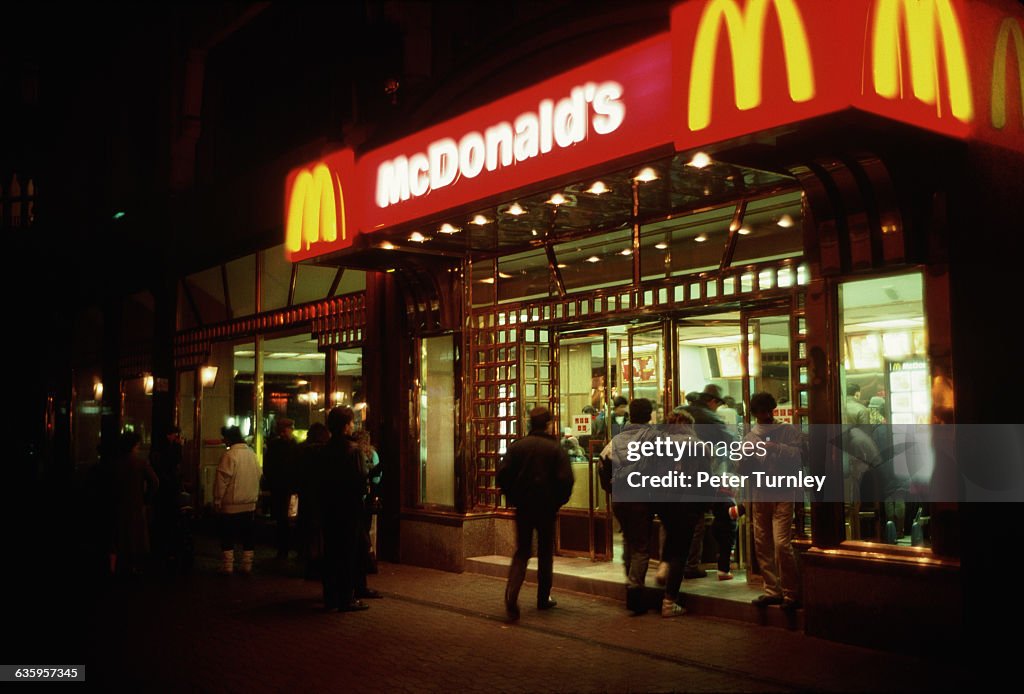 People Going to McDonald's at Night