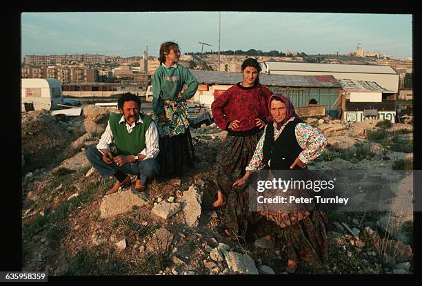 Gypsy Family Posing on a Dirt Mound