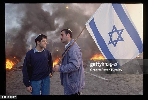 The Israelis are protesting the death of one of their settlers by Palestinian hands.