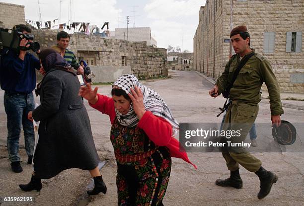 An Israeli Soldier Confronts Palestinian Women