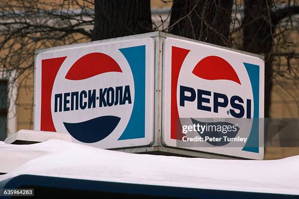 Pepsi logo in English and Russian.