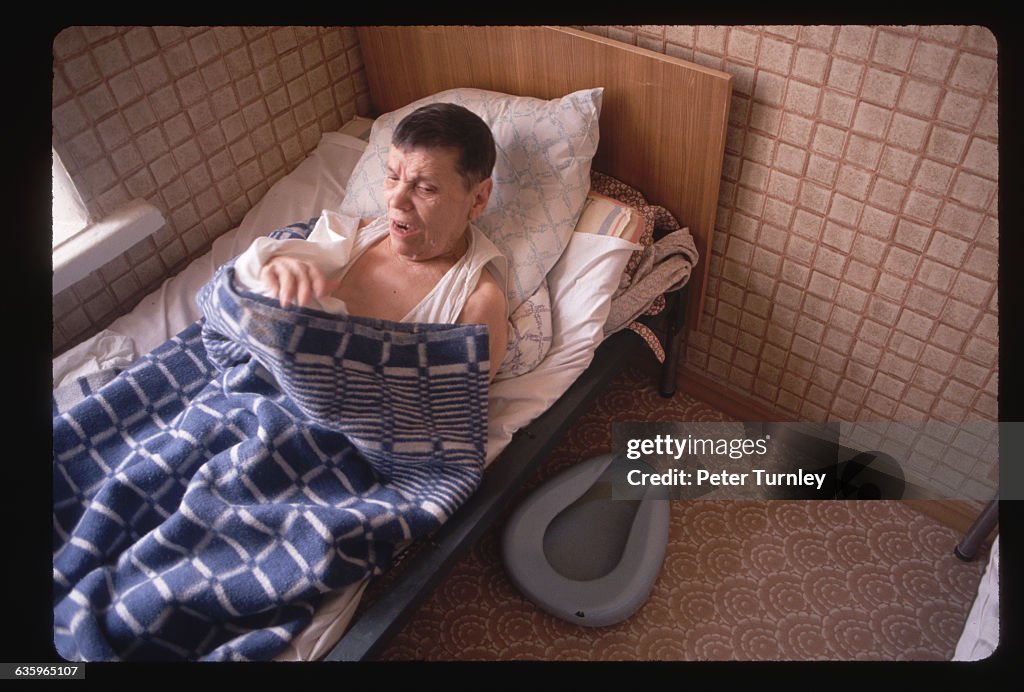Russian Mental Patient in Bed