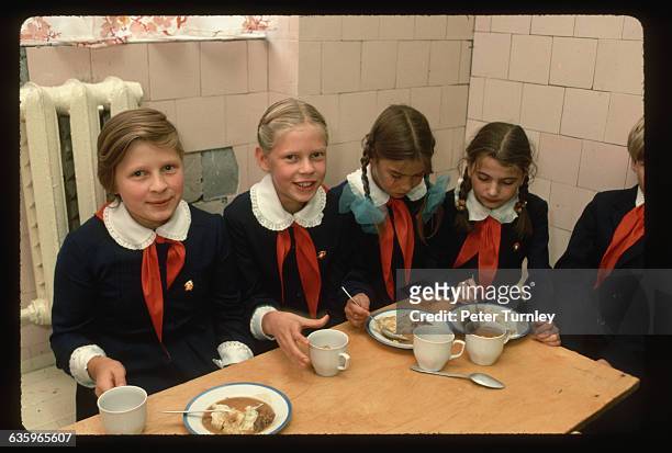 Schoolgirls Eating Lunch