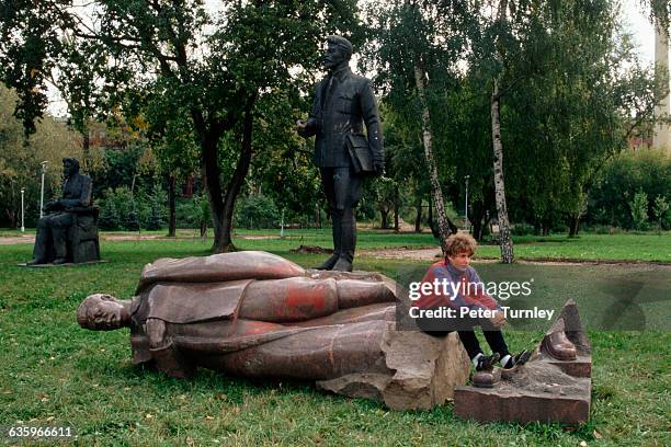 The disrepair of statues of Soviet leaders such as Lenin and Stalin echo the reality of the fall of the Soviet Union.