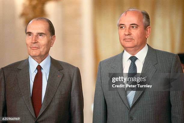 French President Francois Mitterrand visits with Mikhail Gorbachev at the Kremlin during a trip to the Soviet Union.