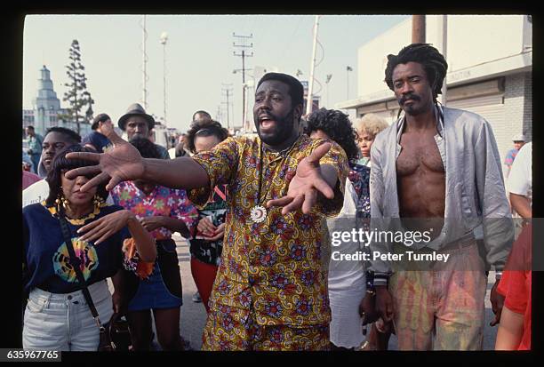 Los Angeles residents gather in the streets in the aftermath of the 1992 riots.