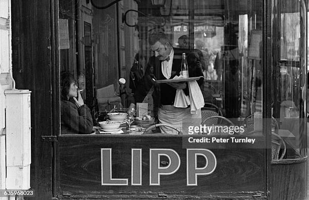 Waiter Serving Guests at Brasserie Lipp