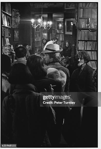 People crowd the stacks at the Shakespeare and Company Bookstore in Paris.