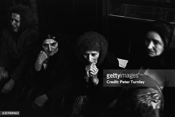 Chechnyan women grieve for lost loved ones during the Russian-Chechen war. As this picture was taken, Russian troops were invading the country in an...