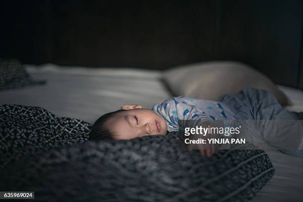 sleeping baby boy - baby sleep stock-fotos und bilder
