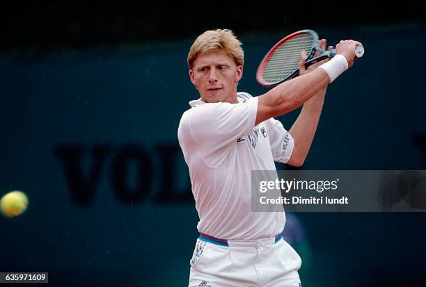 German tennis player Boris Becker prepares to hit a slice backhand during a match in the 1989 Monte-Carlo Open.