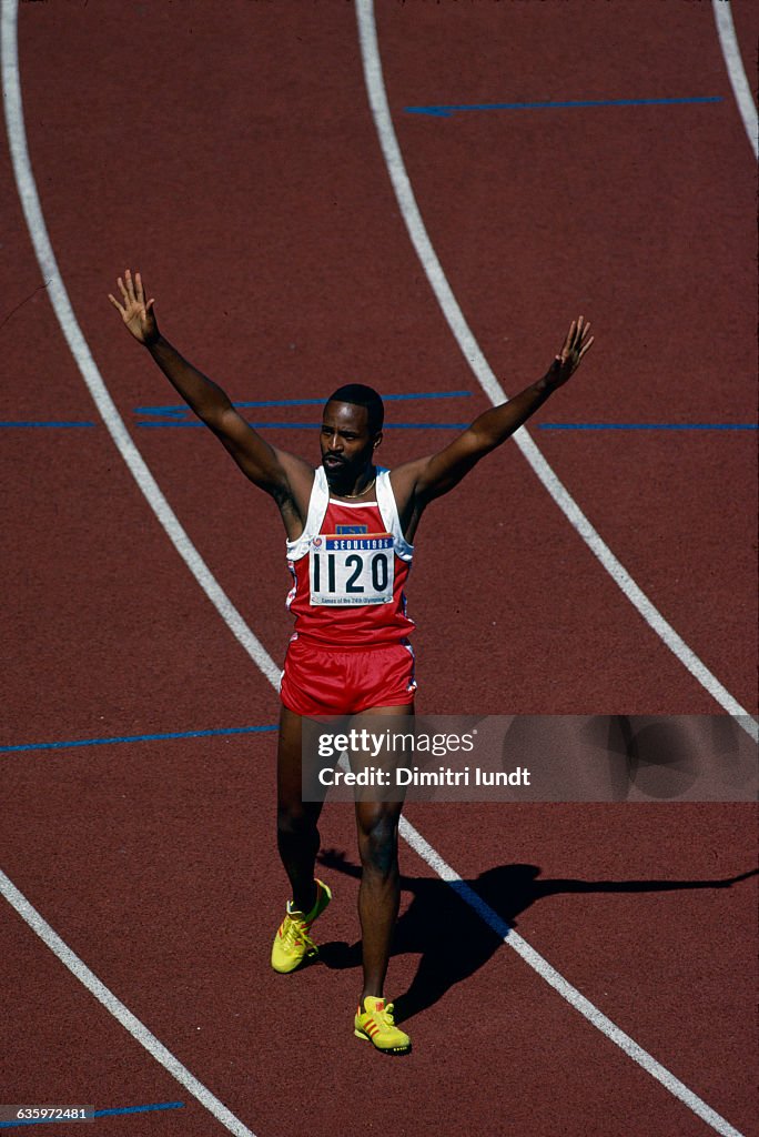 Olympic Medalist Andre Phillips Celebrates Victory