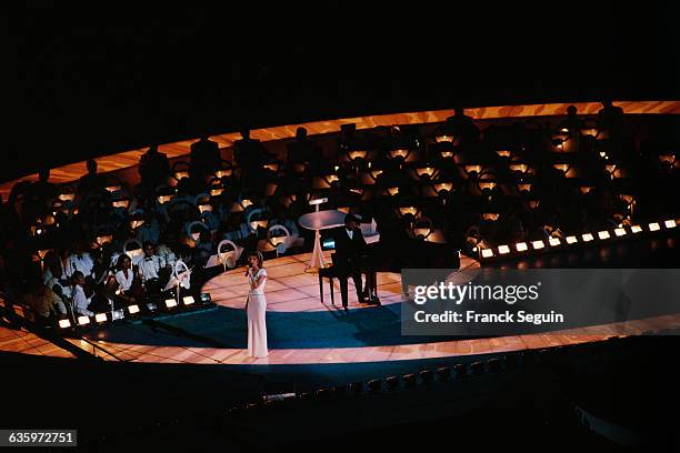 Canadian singer Celine Dion singing at the opening celebrations of the Atlanta Olympics.