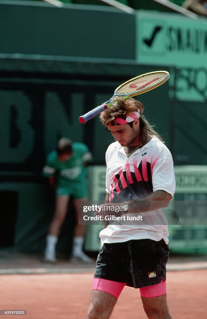 Agassi Smash Racket Andre Agassi throws his racquet during the 1990 Roland Garros tennis ...