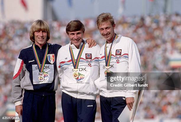 Thierry Vigneron, Sergei Bubka, and Rodion Gataulin, the medal winners for the pole vaulting event.