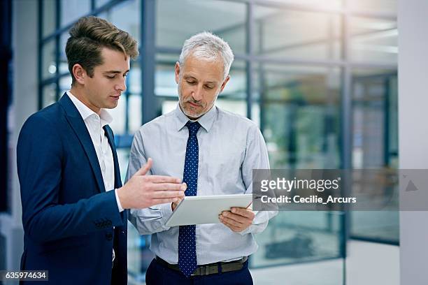 i could use your insight on this... - two businessman stock pictures, royalty-free photos & images