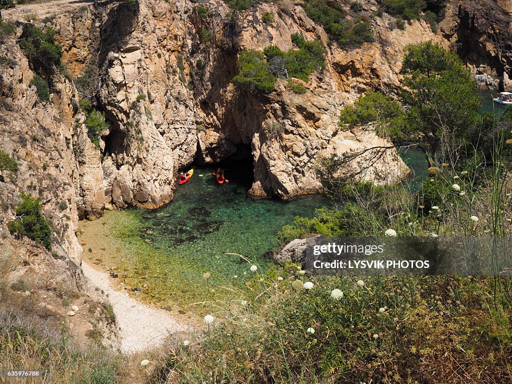 Canoeing in bay coastline Del Castell Palamos, Gerona