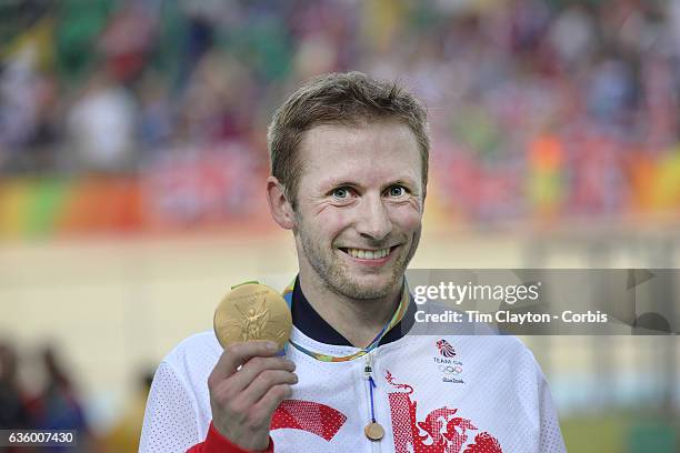 Track Cycling - Olympics: Day 11 Jason Kenny of Great Britain on the podium after his gold medal ride in the Men's Keirin during the track cycling...