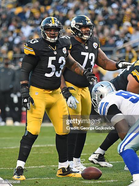 Center Maurkice Pouncey and guard Ramon Foster of the Pittsburgh Steelers look on from the line of scrimmage during a game against the Dallas Cowboys...