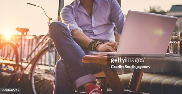 man in cafe - laptop outside stock pictures, royalty-free photos & images