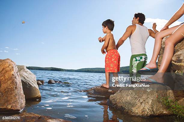 Kids Throwing Rocks Photos and Premium High Res Pictures - Getty Images