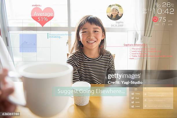 augmented reality daily life with girl - children looking graph stock pictures, royalty-free photos & images