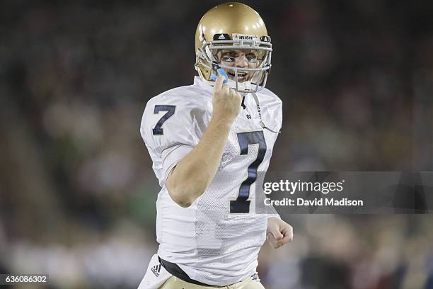 Jimmy Clausen of the Notre Dame Fighting Irish plays in an NCAA football game against the Stanford Cardinal on November 28, 2009 at Stanford Stadium...