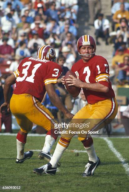 Billy Kilmer Washington Redskins drops back to pass against the Miami Dolphins during Super Bowl VII at the Los Angeles Memorial Coliseum in Los...